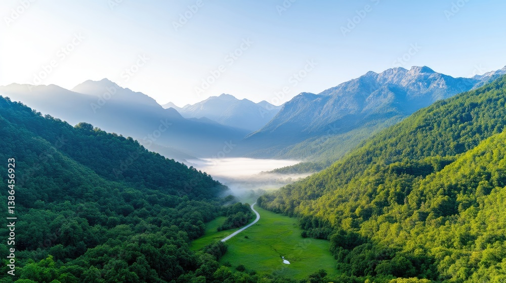 A high-resolution aerial photograph depicts a verdant valley nestled between majestic mountains. A winding road is visible, leading through the valleys lush greenery. The image features clear lighti A high-resolution aerial photograph depicts a verdant valley nestled between majestic mountains. A winding road is visible, leading through the valleys lush greenery. The image features clear lighti