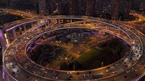 4K Real Time Aerial view of NanPu Bridge and urban traffic in downtown at night