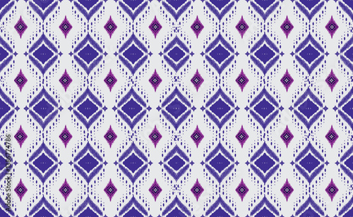 Intricate diamond pattern in indigo and violet tones. This seamless design features a textured weave effect