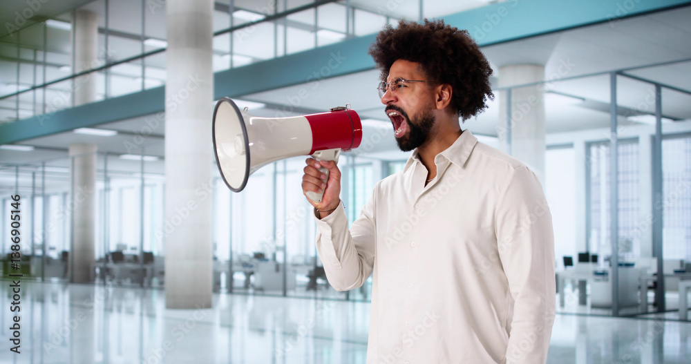 Excited African American man announces news with loudspeaker