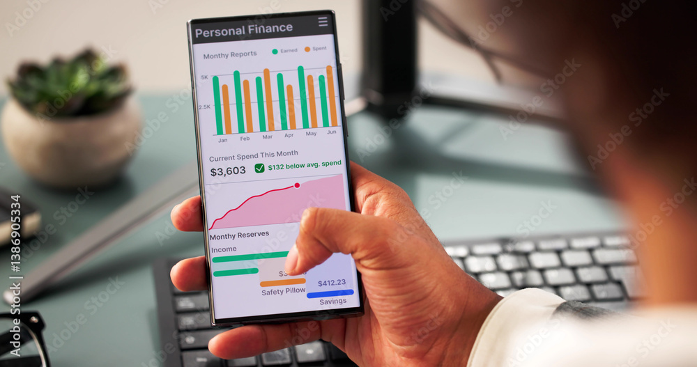Financial Analyst Using Budget App to Track Accounts