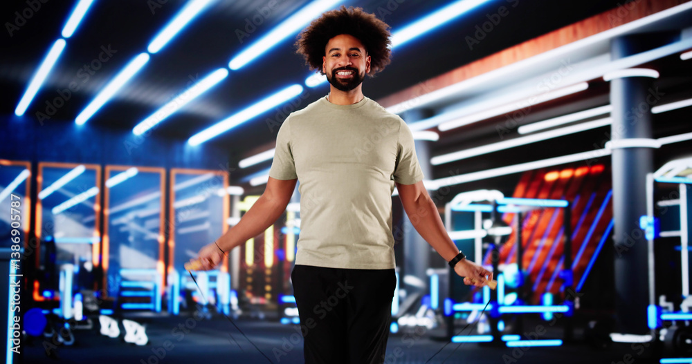 African American man with strong body jumping rope