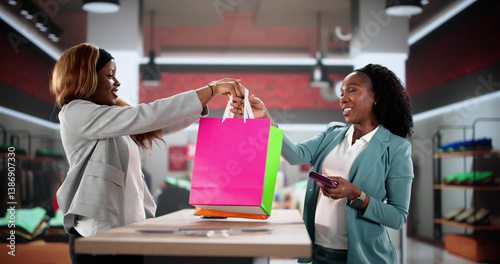 Smiling African American Woman Scanning Clothes