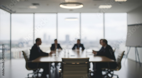 Blurred View of Business Team Meeting Around Table in Modern Office with Cityscape Backdrop