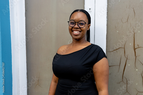 Young black female urban setting cell phone technology