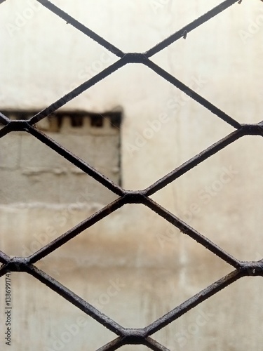 Wallpaper Mural metal fence on a blue background Torontodigital.ca