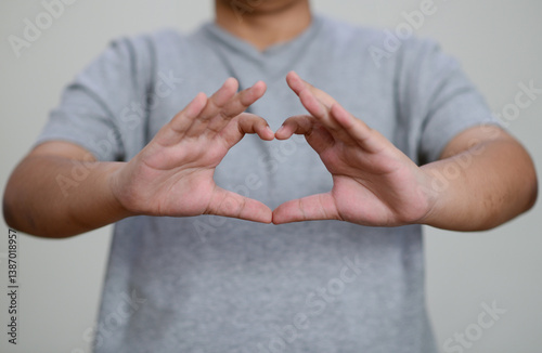 Obraz na płótnie Child's hands make a heart shape. w salonie