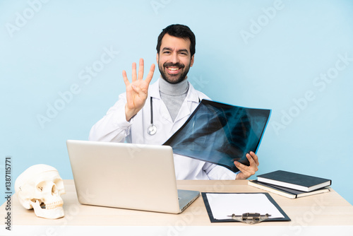 Professional traumatologist in workplace happy and counting four with fingers