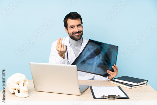Professional traumatologist in workplace making money gesture