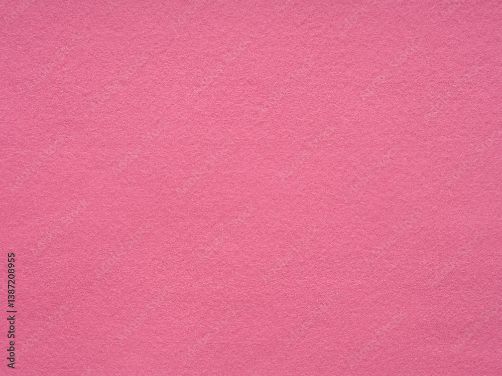 Lush fuchsia felt surface, embodying a mix of playful sophistication and vibrant visual texture