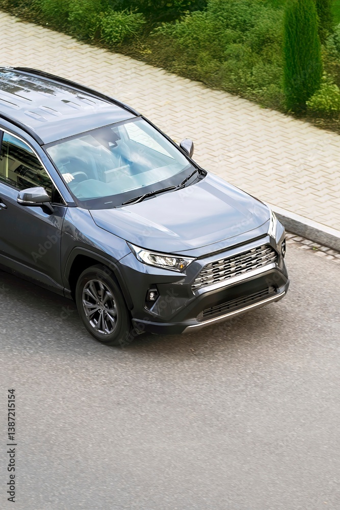 Urban vehicle driving near pavement