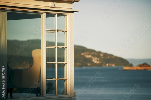 Obraz na płótnie Sunlit Room with Beautiful Fjord and Mountain View w salonie
