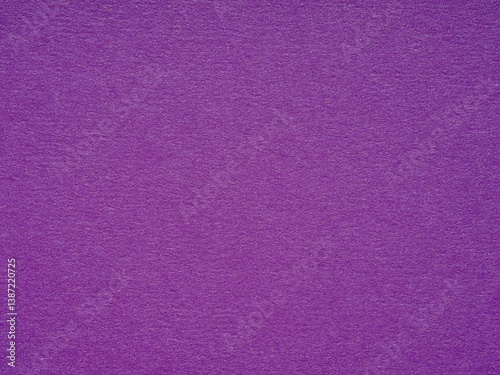 A tapestry of vivid purple, the textured paper speaks of royal elegance and the thrill of the mysterious