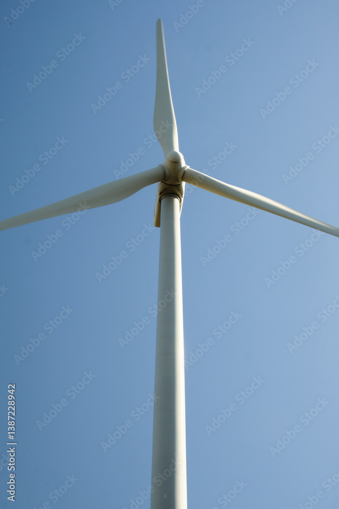 Wind turbine with blue sky at background Wind turbine with blue sky at background