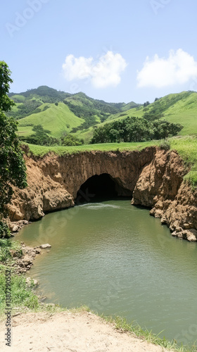 Wallpaper Mural Cave Entrance to Water, Green Hills Backdrop, Copy Space Torontodigital.ca