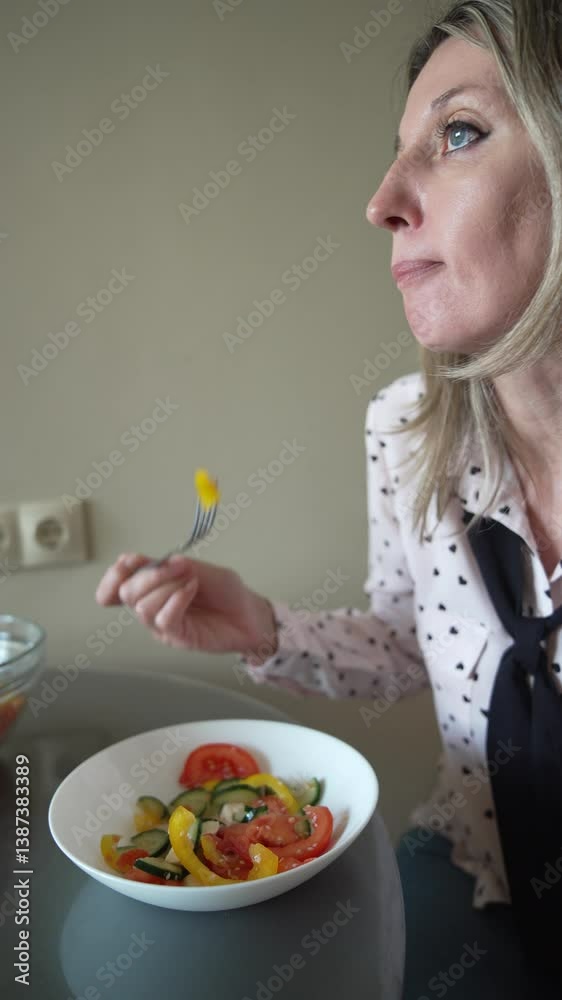 Salad Woman Eating Indoors: Veggie salad at table, eats lunch in a room, feels happy today. Salad Woman Eating Indoors: Veggie salad at table, eats lunch in a room, feels happy today.
