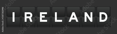 Black color analog flip board with word ireland on gray background