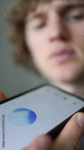 Vertical screen user gently speaks to ChatGPT holding phone close like waiting for advice from a wise friend soft voice blurred face calm tension hopeful human tech moment