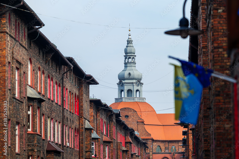 Workers' housing estate. Church tower. Famous district of Katowice Nikiszowiec