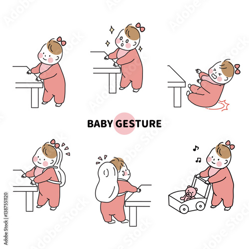 つかまり立ちをする女の子の赤ちゃん