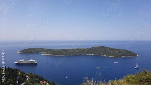 Panoramic view of a green island in the sea