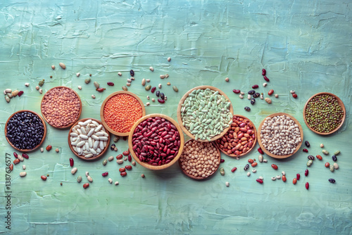 Wallpaper Mural Various legumes, overhead flat lay shot on a blue background. Many different pulses, an assortment. Plant-based food Torontodigital.ca