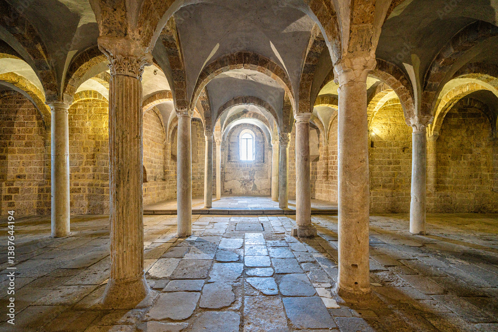 Fototapeta premium Interior sight in the beautiful and ancient Basilica of San Pietro in Tuscania. Province of Viterbo, Lazio, Italy. April-02-2025