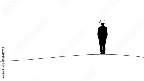 Silhouette figure on hilltop