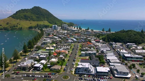 Drone scenery of the Tauranga suburb from above with Mount Maunganui in New Zealand
