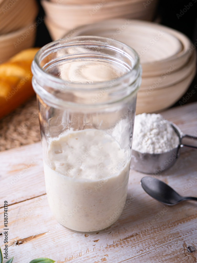 Fermenting Sourdough Starter Wild Yeast in a Kitchen Jar. Fermenting Sourdough Starter Wild Yeast in a Kitchen Jar.