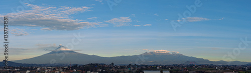 Popocatepetl volcanic landscape with fluffy clouds