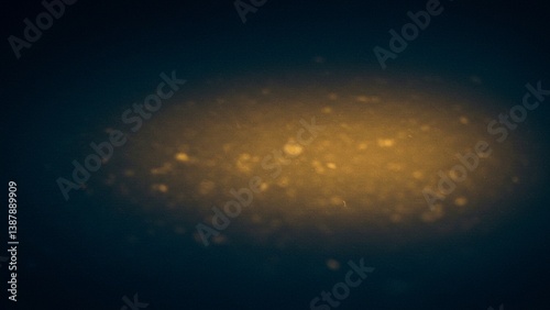 A soft, abstract blurred background featuring warm ochre yellow tones and gentle light effects