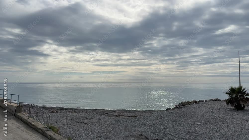 Sea part against the cloudy sky in overcast day Sea part against the cloudy sky in overcast day