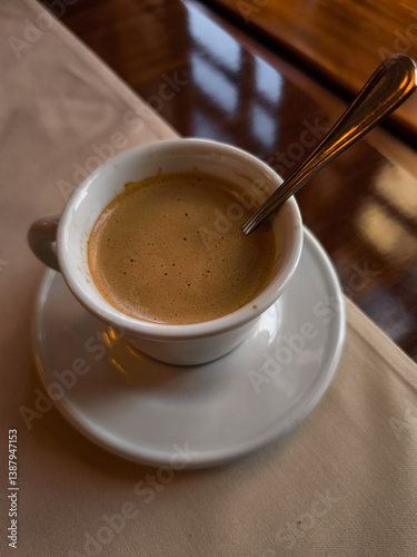 Photography Enjoying a creamy coffee Lungo in a prague cafe during springtime
