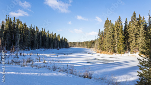 Long morning shadows on Waskesiu River in Prince Albert National Park, Canada, in late March. photo