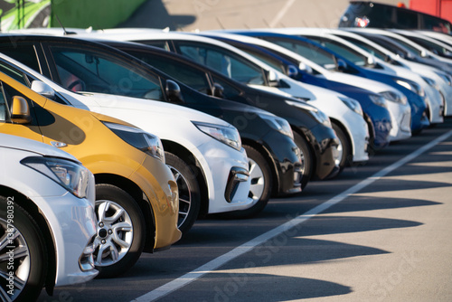 A lot of cars in a rows. Used car sales