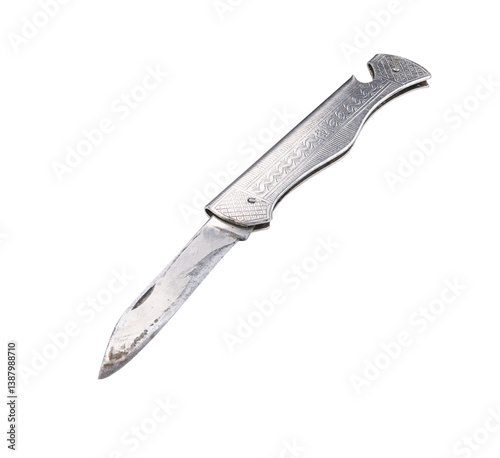 Old metal folding pocket knife isolated on a white background.
