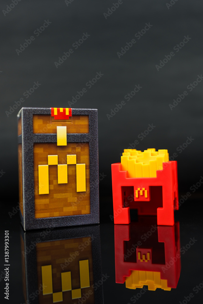 Naklejka premium Bangkok, Thailand - April 6, 2025 : Fry Helmet Minecraft from McDonald, Toy form Minecraft blind box from McDonald's collaborates Minecraft the movice