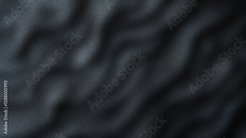 Abstract gradient texture of folded black fabric layers creating a rich and elegant depth in a soft minimal style