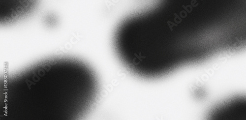 Abstract soft monochrome background with minimal noise texture and gradient blending around circular elements