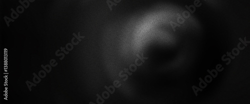 Gray dust particles in soft glow over black abstract gradient with a light spray texture and monochrome noise tone