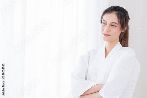 portrait young pretty woman in bathrobe standing in spa room with copy space for text Free Download portrait young pretty woman in bathrobe standing in spa room with copy space for text - GFXLoad