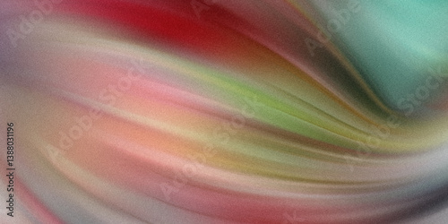 Abstract blurred background with flowing colors of red green pink and light brown shades mix together