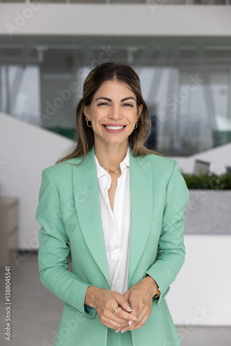 Happy beautiful young Latin business leader woman standing in office interior alone, looking at camera with toothy smile. Businesswoman, female executive, company owner vertical portrait Free Download Happy beautiful young Latin business leader woman standing in office interior alone, looking at camera with toothy smile. Businesswoman, female executive, company owner vertical portrait - GFXLoad