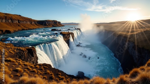 Panoramic shot of Dettifoss waterfall in Iceland at midday, with sunny weather emphasizing the powerful flow of water.