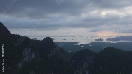 Beautiful drone shot of limestone cliffs and mangrove forest on the coast of Krabi, Thailand.