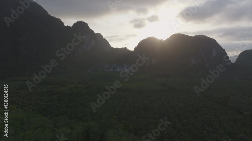 Beautiful drone shot of limestone cliffs and natural green scenery in Krabi, Thailand.