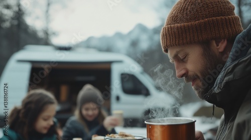 Nomadic family enjoys a warm winter meal beside their camper van, embracing the freedom of vanlife, sharing moments and meals in nature despite the cold weather.
