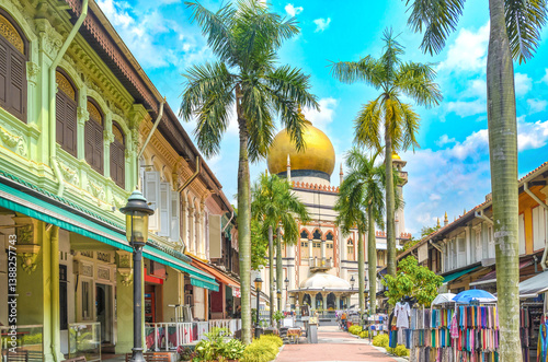 Colorful shophouses with typical shops and the Sultan Mosque in Kampong Glam