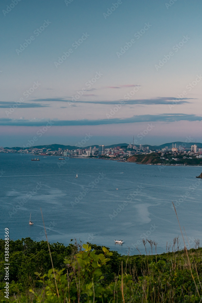View of Vladivostok from Russky Island. Vladivostok is a city in Russia on the coast of the Sea of Japan. View of Vladivostok from Russky Island. Vladivostok is a city in Russia on the coast of the Sea of Japan.